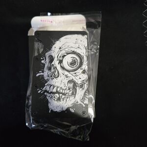 Metal minimalist RFID blocking wallet laser engraved 3D Skeleton.